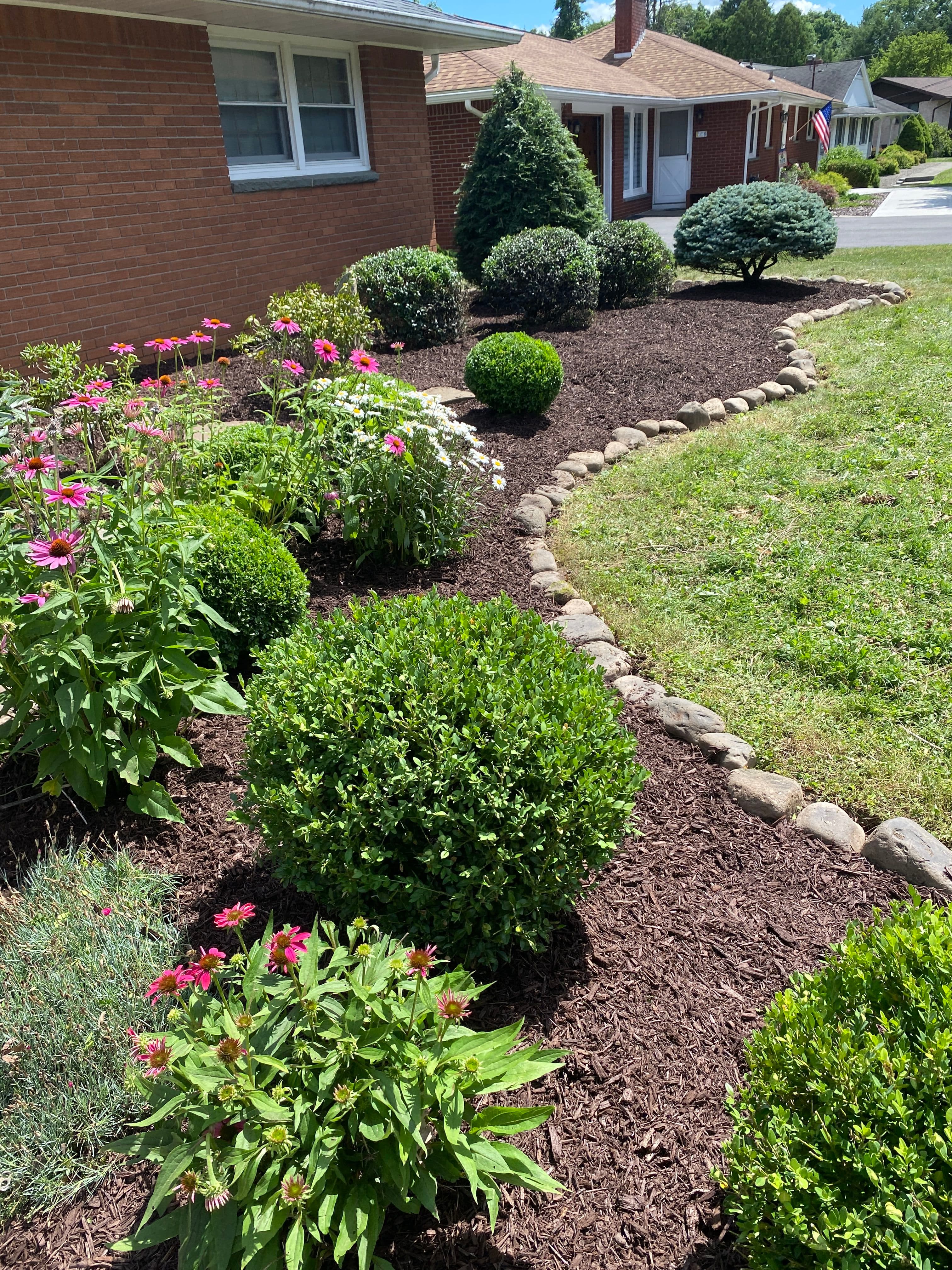 Project Fresh Mulch, Crisp Trimming, and a Cobblestone Edge Done Right image