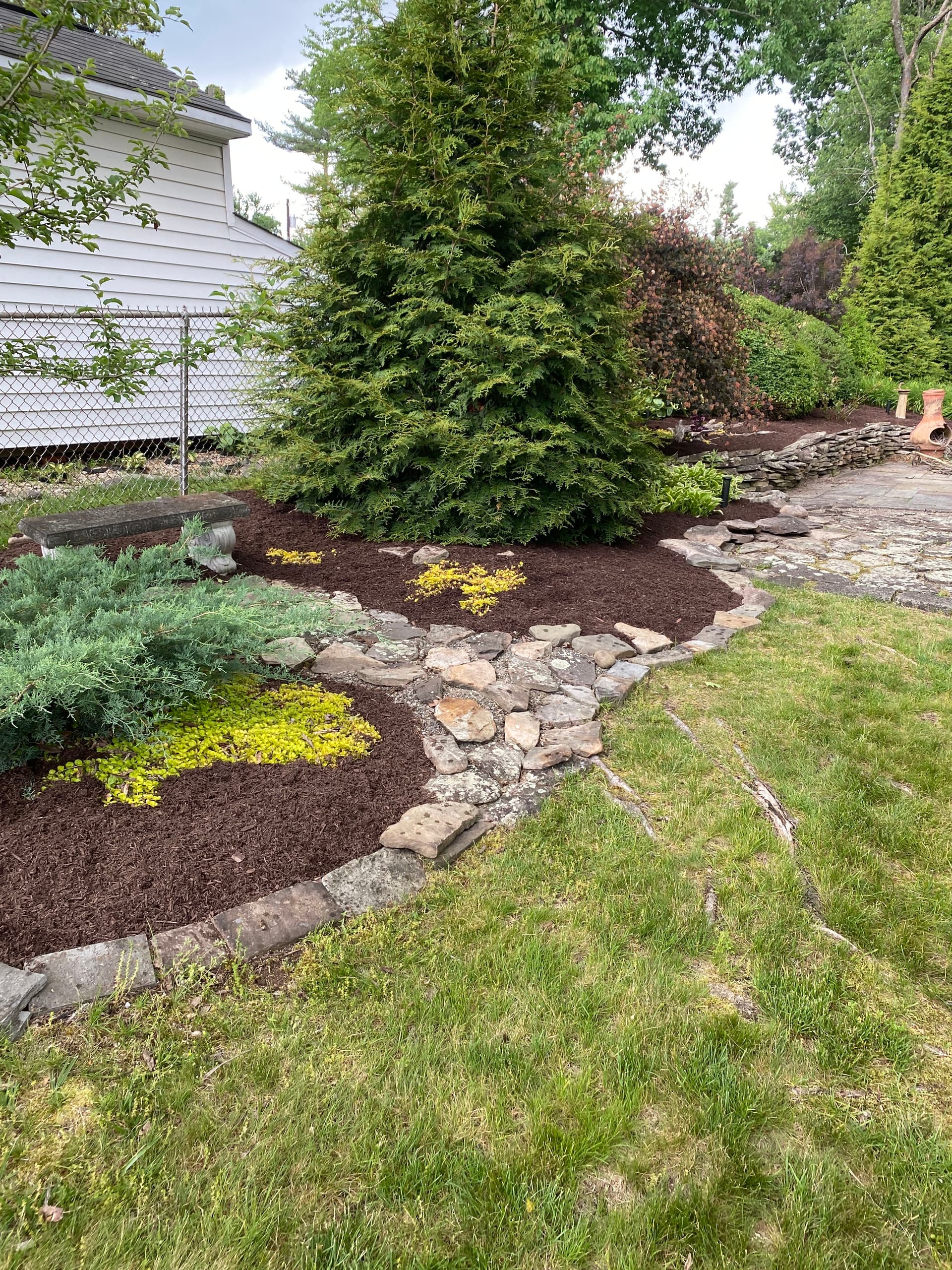 Fresh Hemlock Mulch Install That Makes Every Bed Pop image