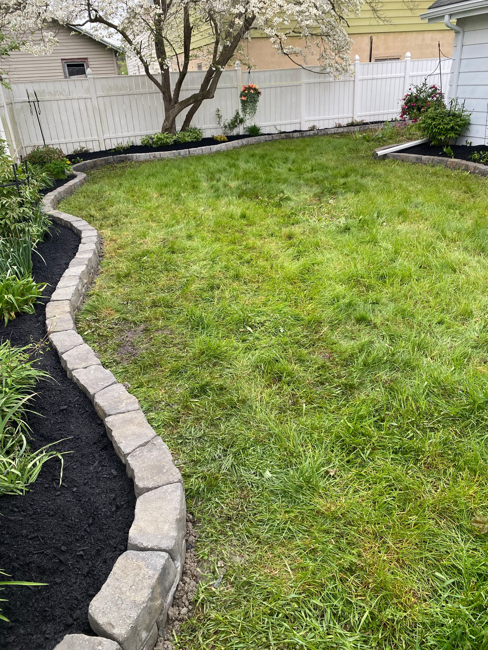 Gallery photos for Stone Garden Wall and Mulch Bed Installation Done Right: Image #1