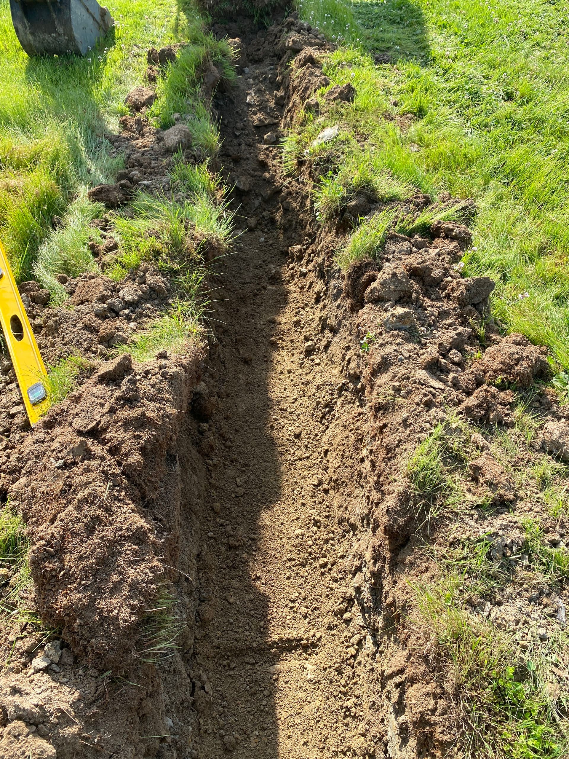 French Drain Installation Puts a Stop to Yard Pooling image